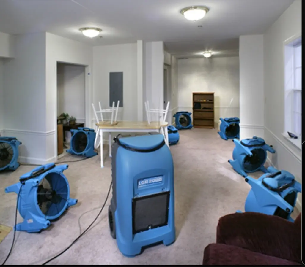 Air movers and dehumidifier setup for Water Damage Restoration in West Bradford